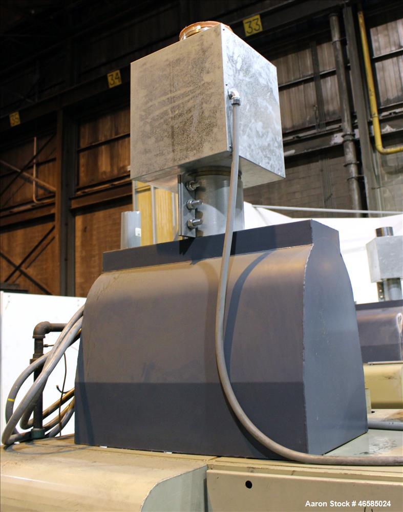 Used Conair Carousel Dehumidifying Dryer, Gas Heated, Model CDG1000, Carbon Steel. Approximate 925 CFM, drying temperature range 160 to 250 degrees F. (5) Desiccant cartridges. Includes CDG1000 Compu...