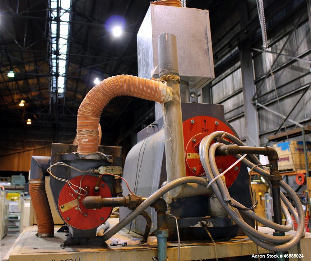 Used Conair Carousel Dehumidifying Dryer, Gas Heated, Model CDG1000, Carbon Steel. Approximate 925 CFM, drying temperature range 160 to 250 degrees F. (5) Desiccant cartridges. Includes CDG1000 Compu...