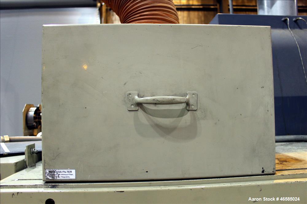 Used Conair Carousel Dehumidifying Dryer, Gas Heated, Model CDG1000, Carbon Steel. Approximate 925 CFM, drying temperature range 160 to 250 degrees F. (5) Desiccant cartridges. Includes CDG1000 Compu...