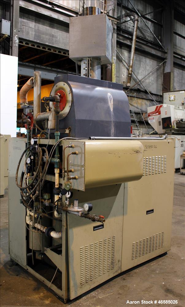 Used Conair Carousel Dehumidifying Dryer, Gas Heated, Model CDG1000, Carbon Steel. Approximate 925 CFM, drying temperature range 160 to 250 degrees F. (5) Desiccant cartridges. Includes CDG1000 Compu...