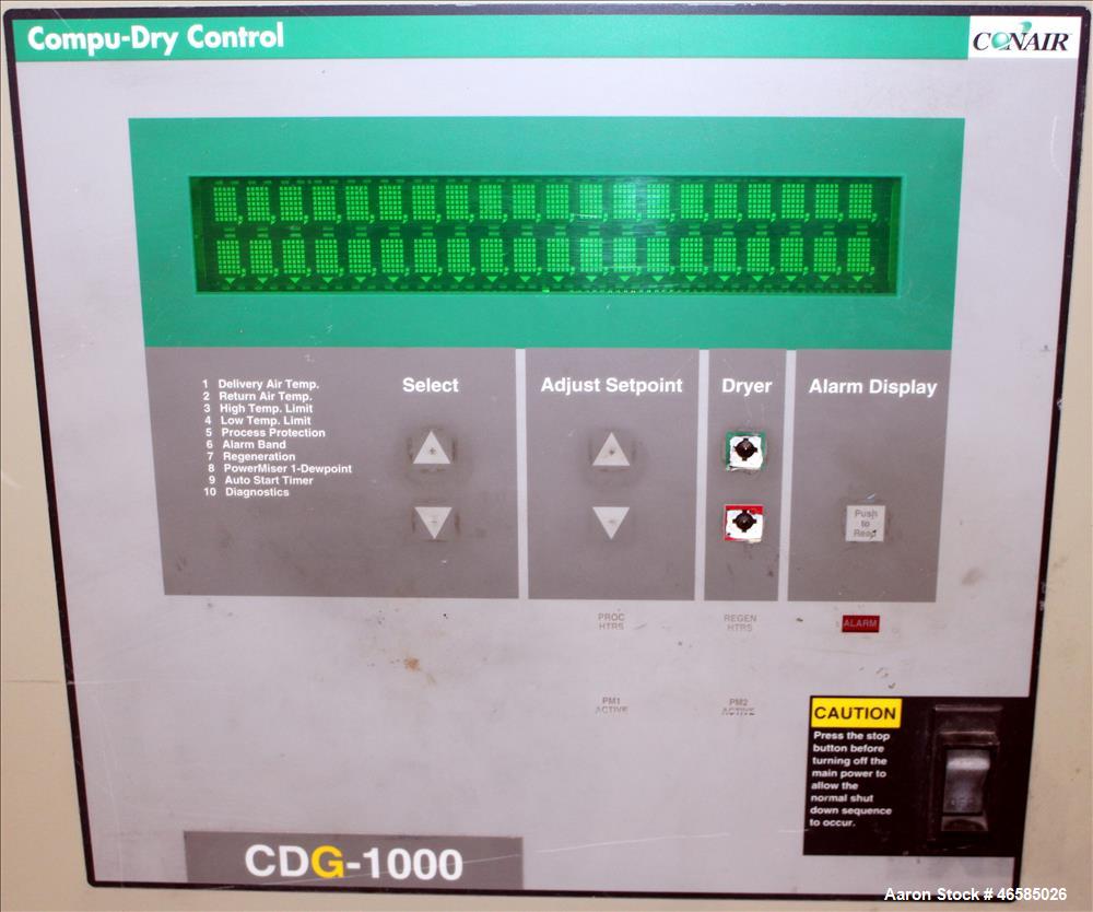 Used Conair Carousel Dehumidifying Dryer, Gas Heated, Model CDG1000, Carbon Steel. Approximate 925 CFM, drying temperature range 160 to 250 degrees F. (5) Desiccant cartridges. Includes CDG1000 Compu...