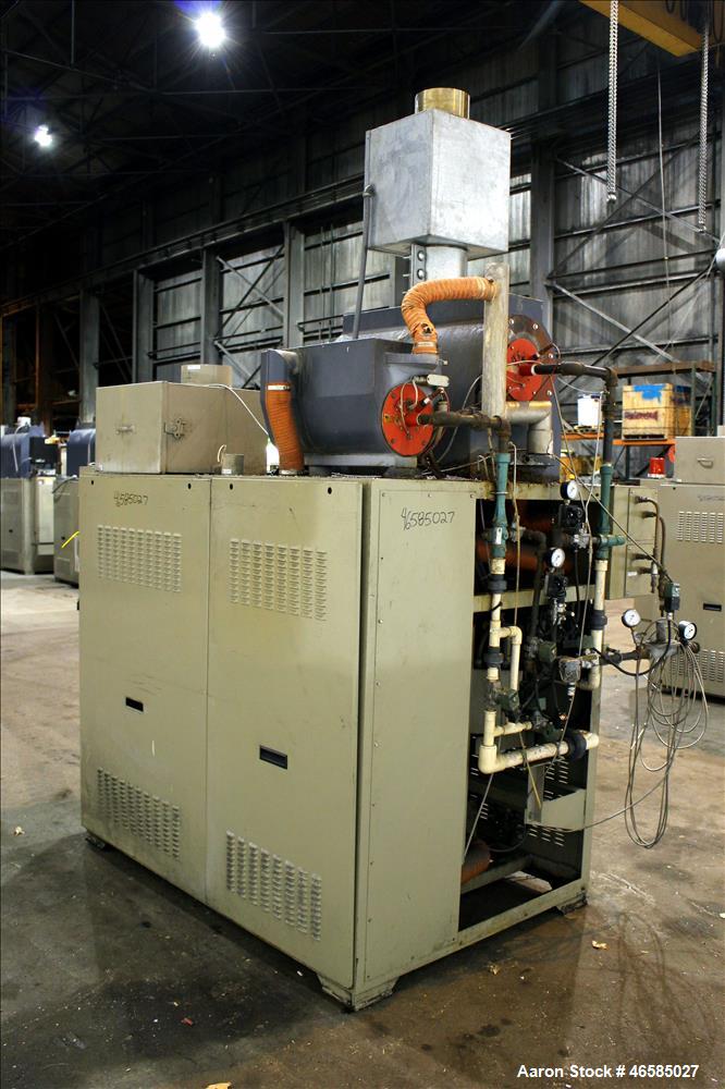 Used Conair Carousel Dehumidifying Dryer, Gas Heated, Model CDG1000, Carbon Steel. Approximate 925 CFM, drying temperature range 160 to 250 degrees F. (5) Desiccant cartridges. Includes CDG1000 Compu...