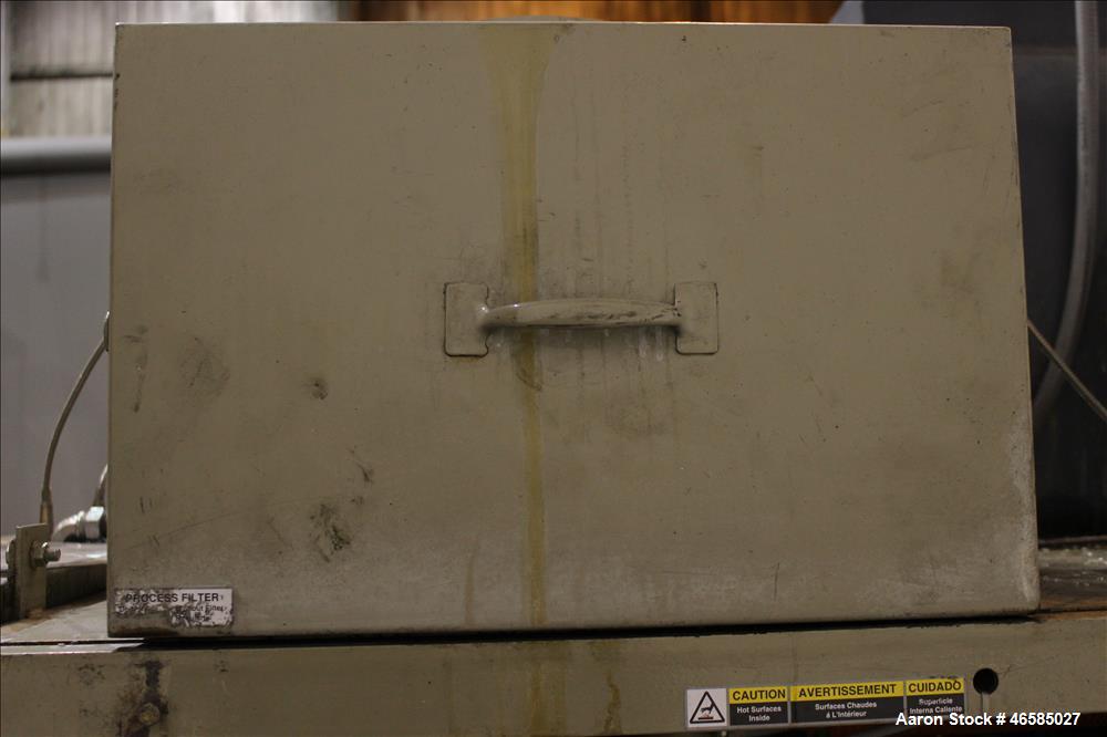 Used Conair Carousel Dehumidifying Dryer, Gas Heated, Model CDG1000, Carbon Steel. Approximate 925 CFM, drying temperature range 160 to 250 degrees F. (5) Desiccant cartridges. Includes CDG1000 Compu...