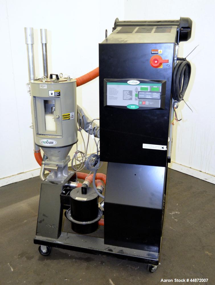 Used Conair MDC Carousel Dehumidifying Dryer, ModelD15, Carbon Steel.  Approximatelt 15 cfm, drying temperature range 100-375 degrees F, 3/60/480 volt, 6.3 amp, serial #160019. Includes a Conair dryi...