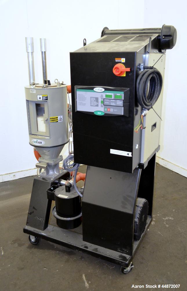 Used Conair MDC Carousel Dehumidifying Dryer, ModelD15, Carbon Steel.  Approximatelt 15 cfm, drying temperature range 100-375 degrees F, 3/60/480 volt, 6.3 amp, serial #160019. Includes a Conair dryi...