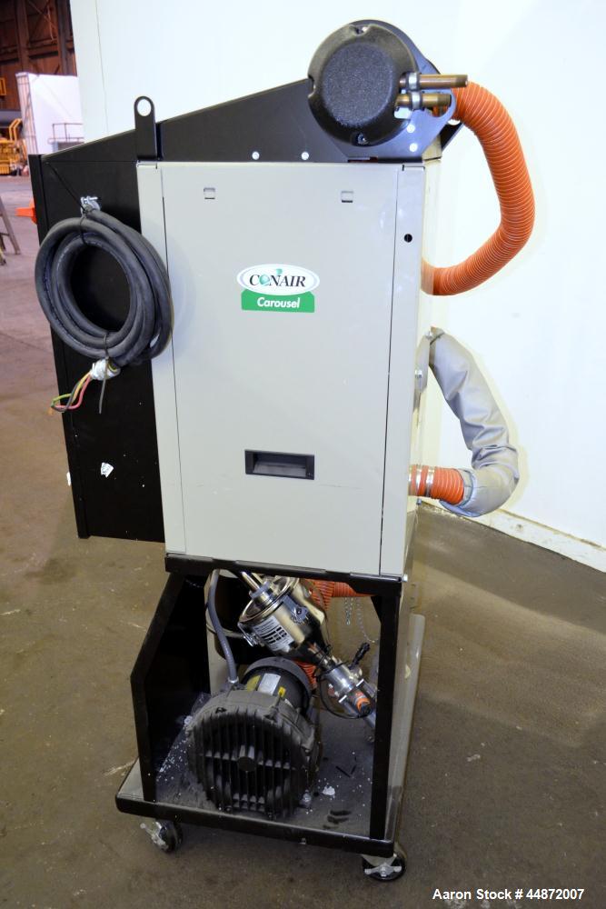 Used Conair MDC Carousel Dehumidifying Dryer, ModelD15, Carbon Steel.  Approximatelt 15 cfm, drying temperature range 100-375 degrees F, 3/60/480 volt, 6.3 amp, serial #160019. Includes a Conair dryi...