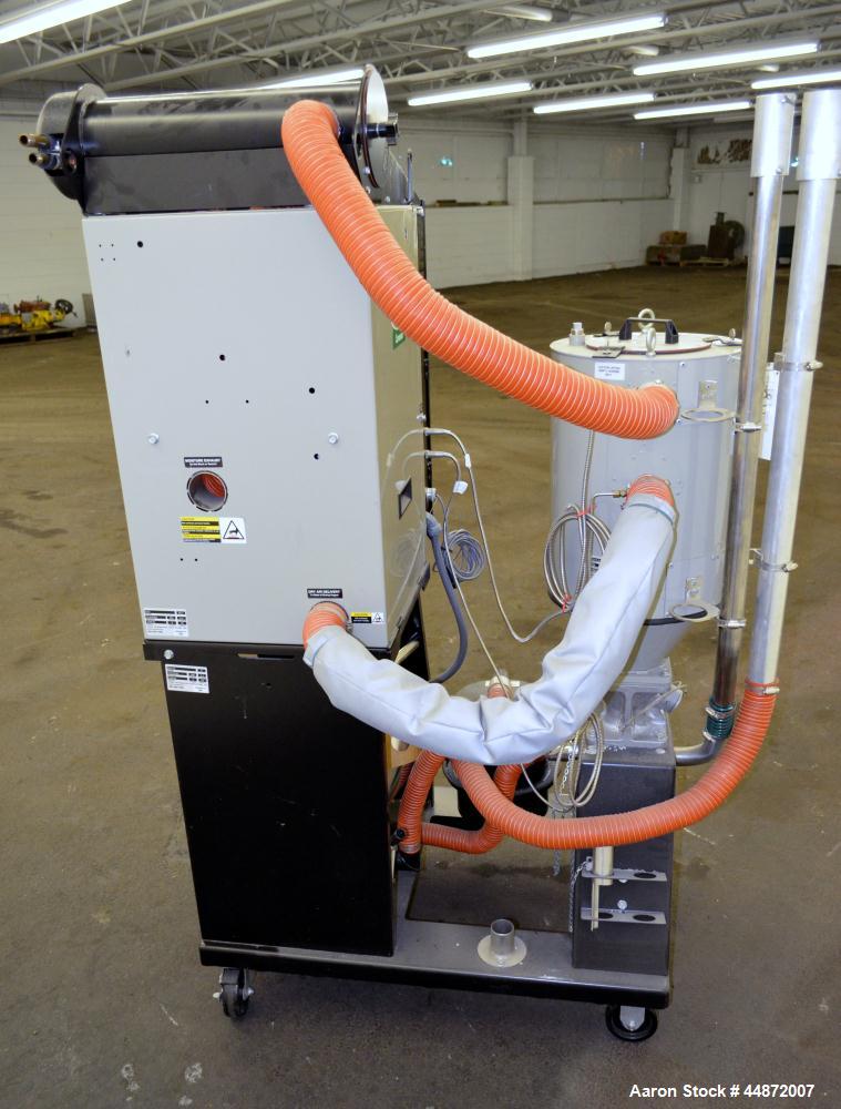 Used Conair MDC Carousel Dehumidifying Dryer, ModelD15, Carbon Steel.  Approximatelt 15 cfm, drying temperature range 100-375 degrees F, 3/60/480 volt, 6.3 amp, serial #160019. Includes a Conair dryi...
