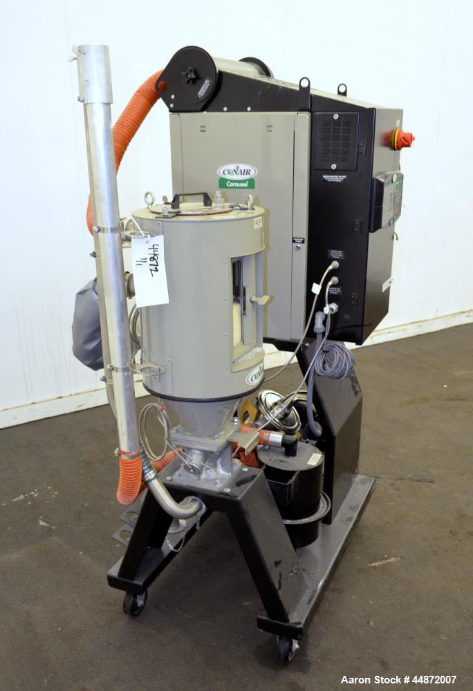 Used Conair MDC Carousel Dehumidifying Dryer, ModelD15, Carbon Steel.  Approximatelt 15 cfm, drying temperature range 100-375 degrees F, 3/60/480 volt, 6.3 amp, serial #160019. Includes a Conair dryi...