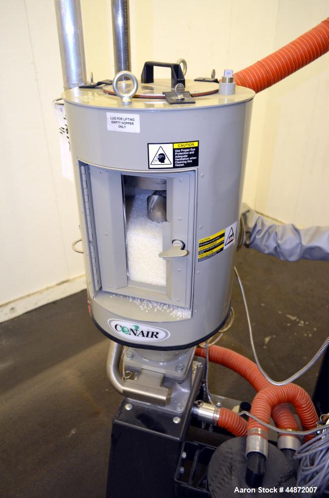 Used Conair MDC Carousel Dehumidifying Dryer, ModelD15, Carbon Steel.  Approximatelt 15 cfm, drying temperature range 100-375 degrees F, 3/60/480 volt, 6.3 amp, serial #160019. Includes a Conair dryi...