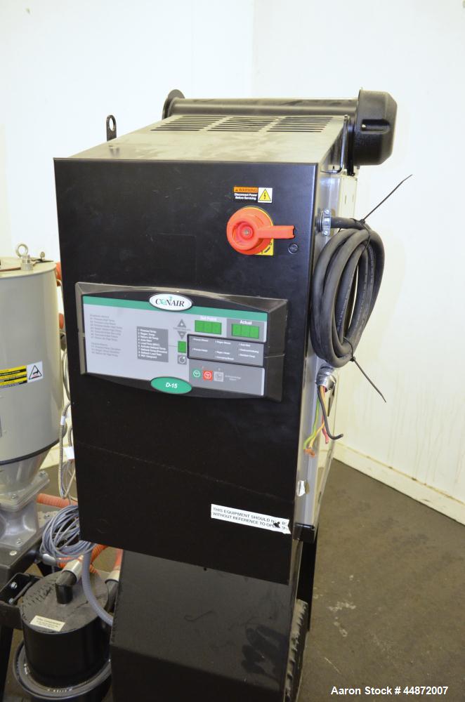 Used Conair MDC Carousel Dehumidifying Dryer, ModelD15, Carbon Steel.  Approximatelt 15 cfm, drying temperature range 100-375 degrees F, 3/60/480 volt, 6.3 amp, serial #160019. Includes a Conair dryi...