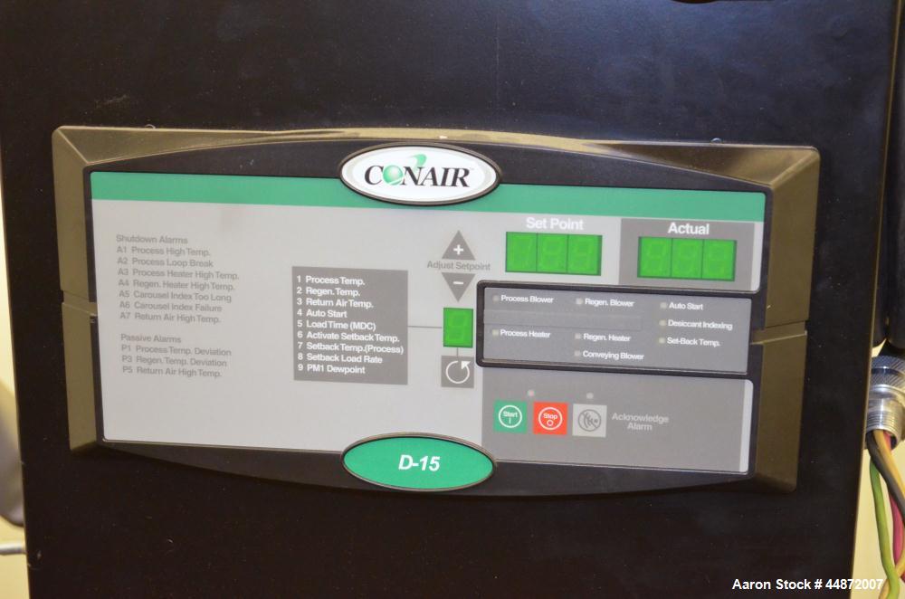 Used Conair MDC Carousel Dehumidifying Dryer, ModelD15, Carbon Steel.  Approximatelt 15 cfm, drying temperature range 100-375 degrees F, 3/60/480 volt, 6.3 amp, serial #160019. Includes a Conair dryi...