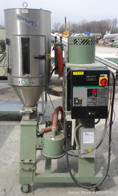 Used Conair Small Carousel Dehumidifying Dryer, model SC7.5, carbon steel, 7.5 cfm. Drying temperature range 150-375 deg F. 3/60/240 volt, 14.7 amp. Includes control panel, blower, and a model CH14-2...