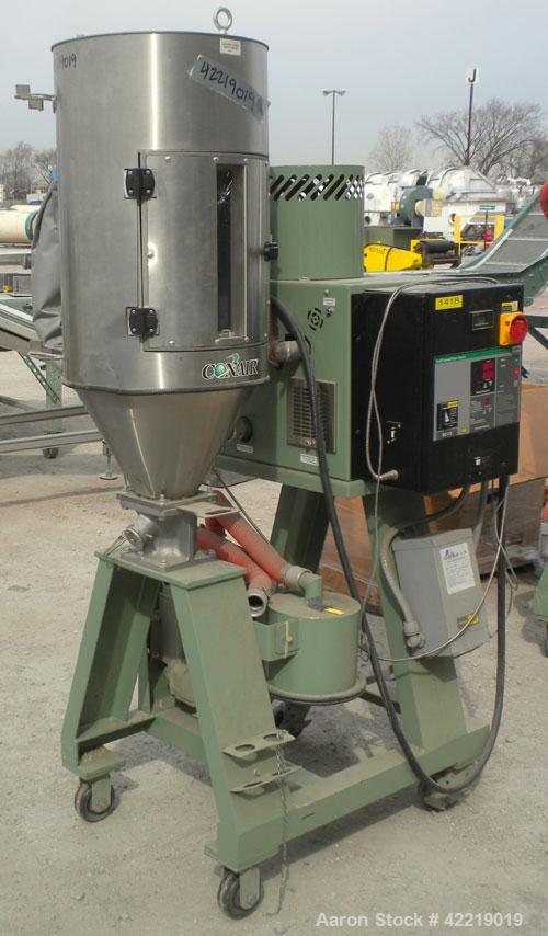 Used Conair Small Carousel Dehumidifying Dryer, model SC7.5, carbon steel, 7.5 cfm. Drying temperature range 150-375 deg F. 3/60/240 volt, 14.7 amp. Includes control panel, blower, and a model CH14-2...
