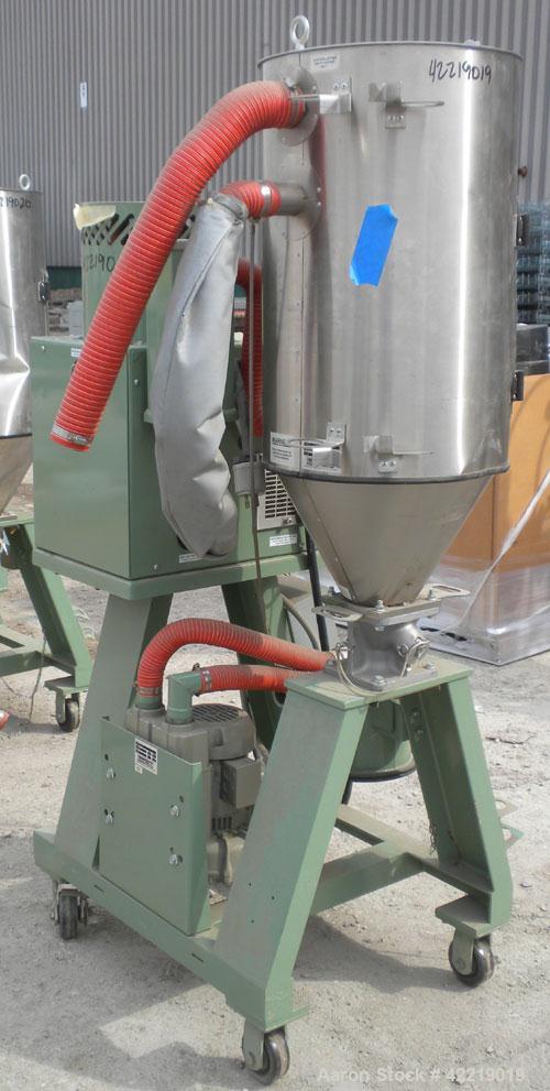 Used Conair Small Carousel Dehumidifying Dryer, model SC7.5, carbon steel, 7.5 cfm. Drying temperature range 150-375 deg F. 3/60/240 volt, 14.7 amp. Includes control panel, blower, and a model CH14-2...