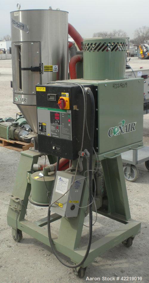 Used Conair Small Carousel Dehumidifying Dryer, model SC7.5, carbon steel, 7.5 cfm. Drying temperature range 150-375 deg F. 3/60/240 volt, 14.7 amp. Includes control panel, blower, and a model CH14-2...