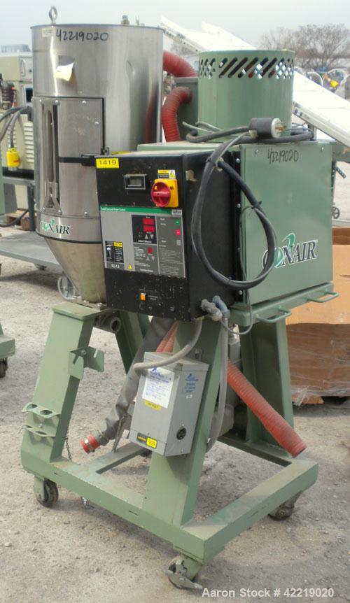 Used Conair Small Carousel Dehumidifying Dryer, model SC7.5, carbon steel, 7.5 cfm. Drying temperature range 150-375 deg F. 3/60/240 volt, 14.7 amp. Includes control panel, blower, and a model CH14-2...