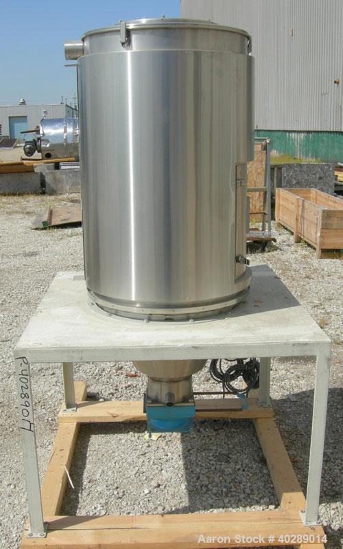 Used Dri Air desiccant dryer, model HP4-X 150. Rated 150 cfm. 3/575/25 amp. Includes a Dri-Air 400 pound 304 stainless steel insulated drying  hopper, model RH400, mounted on a stand.