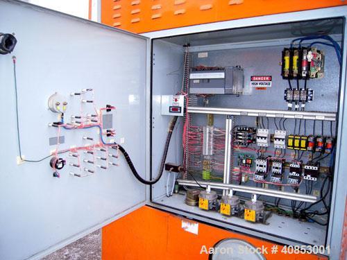 Used Motan Drying System consisting of: (1) Motan central system dehumidifying dryer, model MXS1200, approximately 1200 cfm, 3/60/480 volt. (4) Motan model DE1600ETA Process Insulated LuxorBins, alum...
