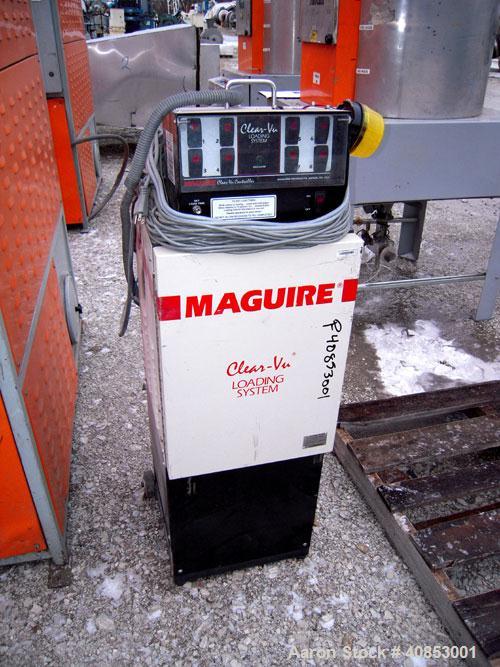 Used Motan Drying System consisting of: (1) Motan central system dehumidifying dryer, model MXS1200, approximately 1200 cfm, 3/60/480 volt. (4) Motan model DE1600ETA Process Insulated LuxorBins, alum...
