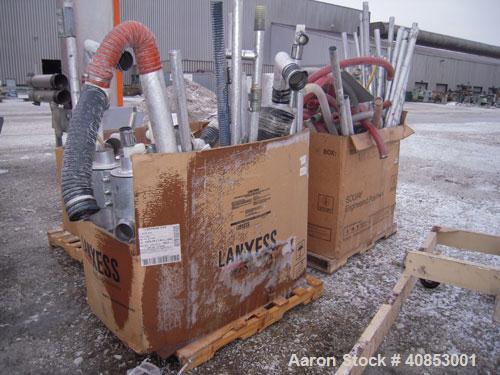 Used Motan Drying System consisting of: (1) Motan central system dehumidifying dryer, model MXS1200, approximately 1200 cfm, 3/60/480 volt. (4) Motan model DE1600ETA Process Insulated LuxorBins, alum...