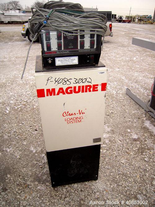 Used Motan Drying System consisting of: (1) Motan central system dehumidifyng dryer, model MXS1200, approximately 1200 cfm, 3/60/480 volt. (4) Motan model DE1600ETA Process Insulated LuxorBins, alumi...