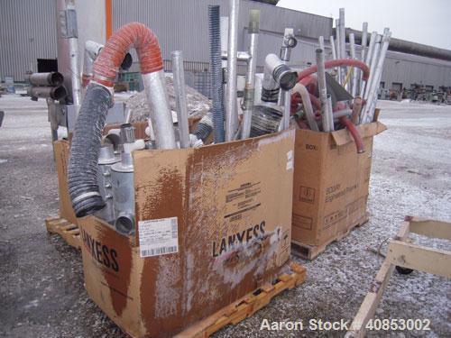 Used Motan Drying System consisting of: (1) Motan central system dehumidifyng dryer, model MXS1200, approximately 1200 cfm, 3/60/480 volt. (4) Motan model DE1600ETA Process Insulated LuxorBins, alumi...