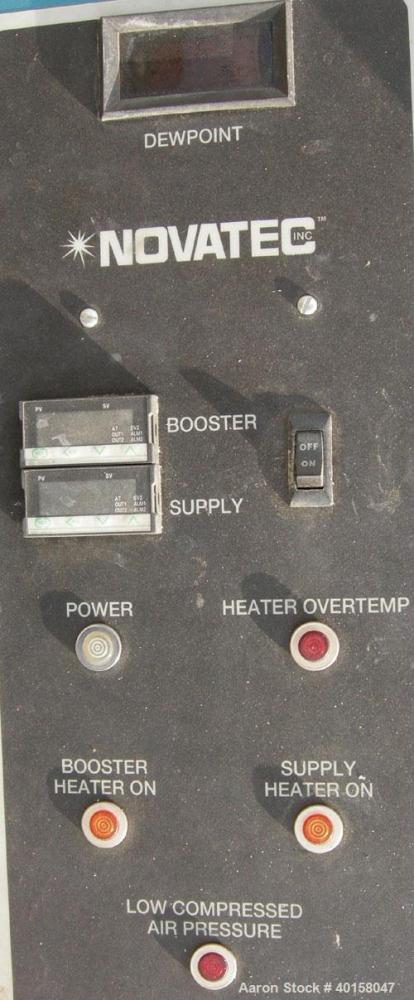Used Novatec Nova Drier non-desiccant resin dryer, model N-25. Throughput capacity 25 pounds an hour, 5.7 scfm. Constant -40 deg or lower dewpoint process air in less than 4 minutes. Standard process...