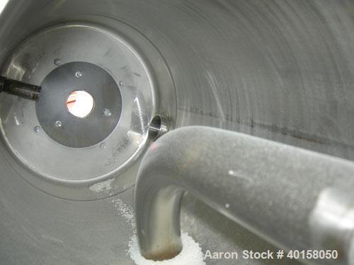Used Novatec Nova Drier non-desiccant resin dryer, model N-25. Throughput capacity 25 pounds an hour, 5.7 scfm. Constant -40 deg or lower dewpoint process air in less than 4 minutes. Standard process...