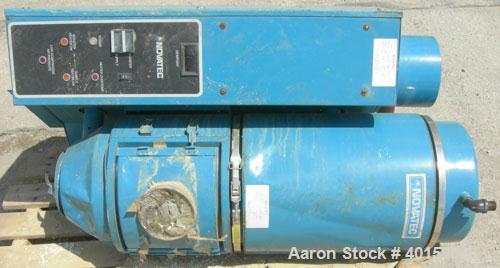 Used Novatec NovaDrier non-desiccant resin dryer, model N-25. Throughput capacity 25 pounds an hour, 5.7 scfm. Constant -40 deg. or lower dewpoint process air in less than 4 minutes. Standard process...