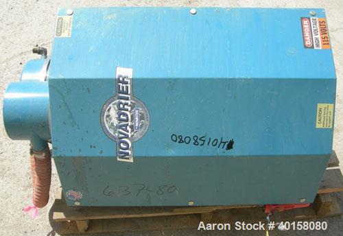 Used Novatec NovaDrier non-desiccant resin dryer, model N-25. Throughput capacity 25 pounds an hour, 5.7 scfm. Constant -40 deg. or lower dewpoint process air in less than 4 minutes. Standard process...