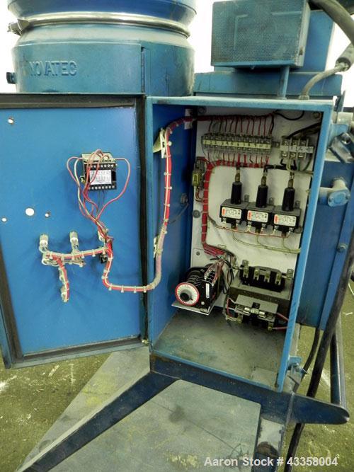 Used Novatec Micro Resin Dryer, Model MD-15. Throughput capacity 15 pounds an hour, 15 cfm. Constant -40 deg. Standard process temperature 275 degrees F. 1/60/460 volt, 2.3 kva, 4.8 amps. Unit includ...