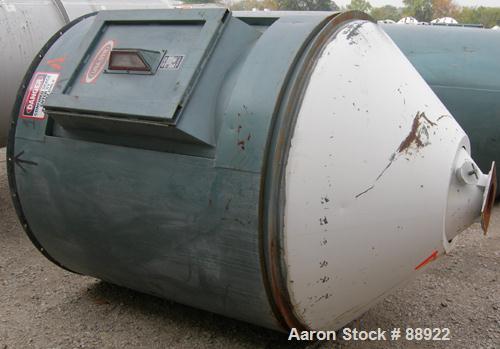 Used Unadyn Dehumidifier Dryer, Model DHD-10060. Dual desiccant beds. 2500 process CFM. 3/60/460 Volt. Includes a control panel, 5000 pound 2 section drying hopper and a cyclone.