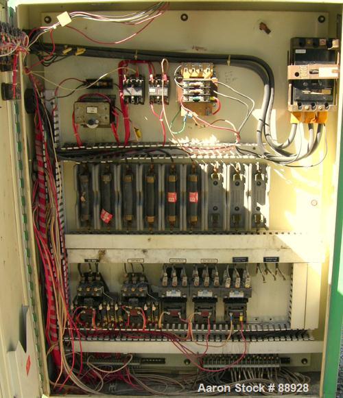 Used Unadyn Dehumidifier Dryer, Model DHD-50. Dual desiccant beds, 1250 process CFM, 3/60/460 Volt. Includes a control panel, 5000 pound 2 section drying hopper and a cyclone.