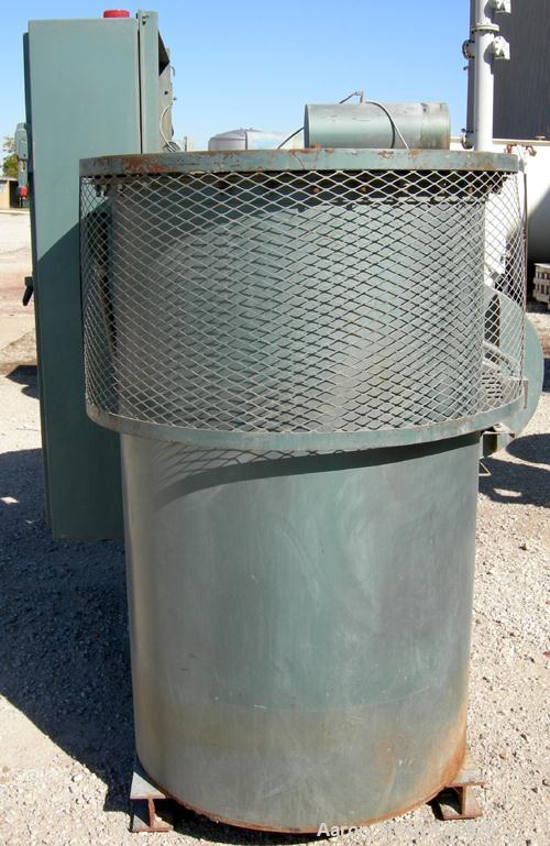 USED: Unadyn dehumidifier dryer, model DHD-60. Dual desiccant beds. 1500 process cfm. 3/60/460 volt. Includes a control panel with touch screen, 5000 pound 2 section drying hopper, an afterheater and...