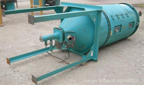 Used Unadyn Dehumidifier Dryer, model DHD-11. Dual desiccant beds, 350 process cfm, 3/60/230 volt, 106 amp, 42 kva. Includes a control panel, approximately 1500 pound drying hopper with stand and a f...