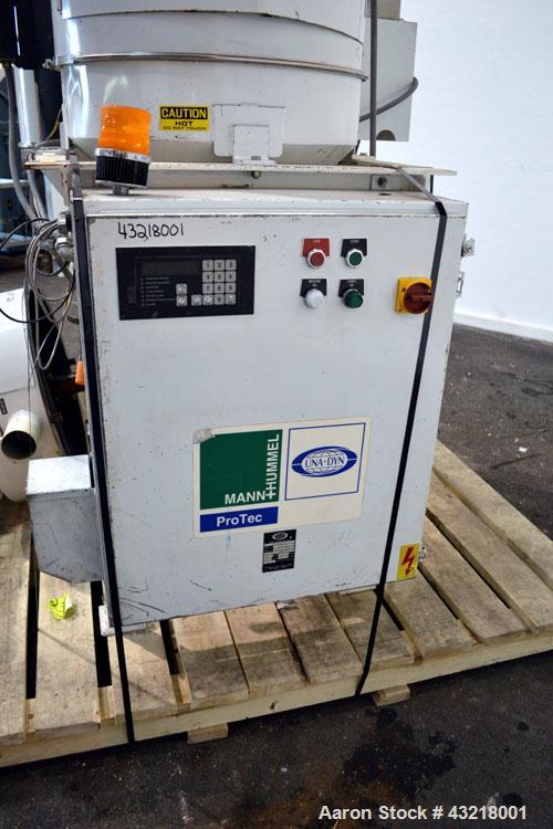 Used Una-Dyn Closed Circuit Crystallizer, Model XTLR-600, Carbon Steel. Approximate through-put 600 pounds per hour. Includes an insulated drying hopper, agitator arm assembly with motor, 5hp blower,...