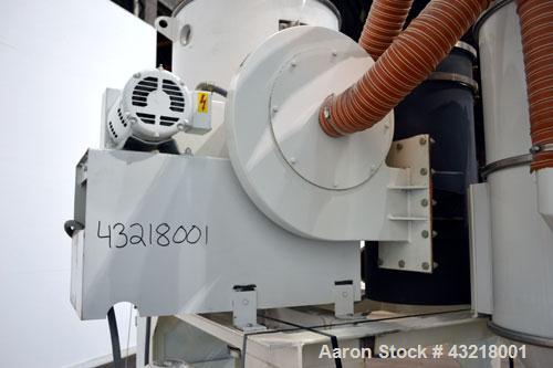 Used Una-Dyn Closed Circuit Crystallizer, Model XTLR-600, Carbon Steel. Approximate through-put 600 pounds per hour. Includes an insulated drying hopper, agitator arm assembly with motor, 5hp blower,...