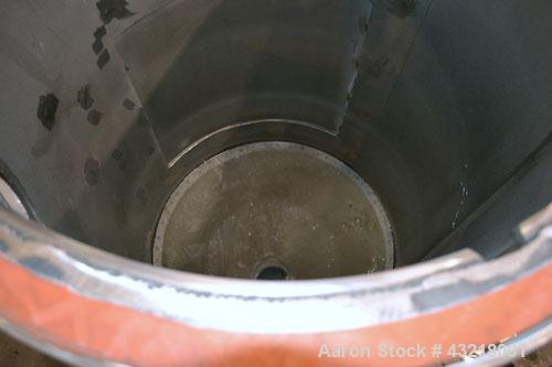 Used Una-Dyn Closed Circuit Crystallizer, Model XTLR-600, Carbon Steel. Approximate through-put 600 pounds per hour. Includes an insulated drying hopper, agitator arm assembly with motor, 5hp blower,...