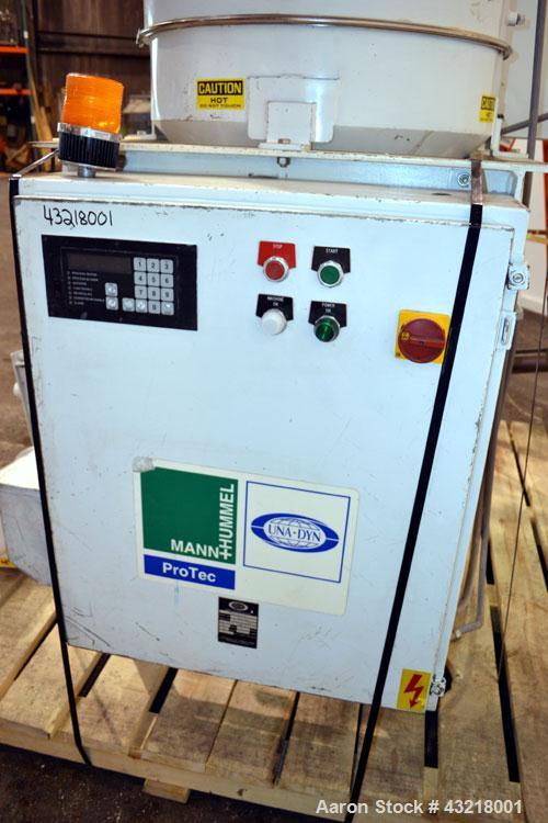 Used Una-Dyn Closed Circuit Crystallizer, Model XTLR-600, Carbon Steel. Approximate through-put 600 pounds per hour. Includes an insulated drying hopper, agitator arm assembly with motor, 5hp blower,...