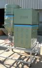 USED: Cincinnati Milacron Dryer, model DD-100. Temp range approximately 170 to 250 deg F. Air flow approximately 75 cfm. 3/60/460 volt, 14 amp. Includes an insulated hopper. Mounted on a frame with c...
