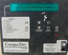Used Conair Drying System consisting of: (1) Conair dehumidifying dryer, model CD200, 150 CFM, temperature range 160 - 250 Degrees F. 3 desiccant cartridges. 3/60/480 Volt. Includes Compudry control ...