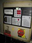Used Conair Compu Dry Dehumidifying Dryer, Model CD30. Approximately 30 cfm. Includes insulated hopper.