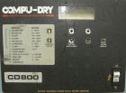 Used Conair dehumidifying dryer, model CD800, 600 cfm. 5 desiccant cartridges. 3/60/480 volt. Includes Compudry control panel, and a model 1805190800SP insulated drying hopper, 44