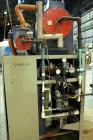 Used Conair Carousel Dehumidifying Dryer, Gas Heated, Model CDG1000, Carbon Steel. Approximate 925 CFM, drying temperature range 160 to 250 degrees F. (5) Desiccant cartridges. Includes CDG1000 Compu...