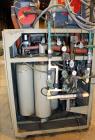 Used Conair Carousel Dehumidifying Dryer, Gas Heated, Model CDG1000, Carbon Steel. Approximate 925 CFM, drying temperature range 160 to 250 degrees F. (5) Desiccant cartridges. Includes CDG1000 Compu...