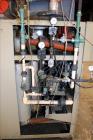 Used Conair Carousel Dehumidifying Dryer, Gas Heated, Model CDG1000, Carbon Steel. Approximate 925 CFM, drying temperature range 160 to 250 degrees F. (5) Desiccant cartridges. Includes CDG1000 Compu...