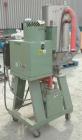 Used Conair Small Carousel Dehumidifying Dryer, model SC7.5, carbon steel, 7.5 cfm. Drying temperature range 150-375 deg F. 3/60/240 volt, 14.7 amp. Includes control panel, blower, and a model CH14-2...