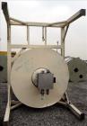 Used-Conair Drying Hopper. Approximate 8,000 Lbs. capacity. Insulated. Mounted on a carbon steel frame.