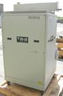 Used Dri Air desiccant dryer, model HP4-X 150. Rated 150 cfm. 3/575/25 amp. Includes a Dri-Air 400 pound 304 stainless steel insulated drying  hopper, model RH400, mounted on a stand.