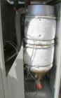 Used Dri Air desiccant dryer, model HP4-X 150. Rated 150 cfm. 3/575/25 amp. Includes a Dri-Air 400 pound 304 stainless steel insulated drying  hopper, model RH400, mounted on a stand.